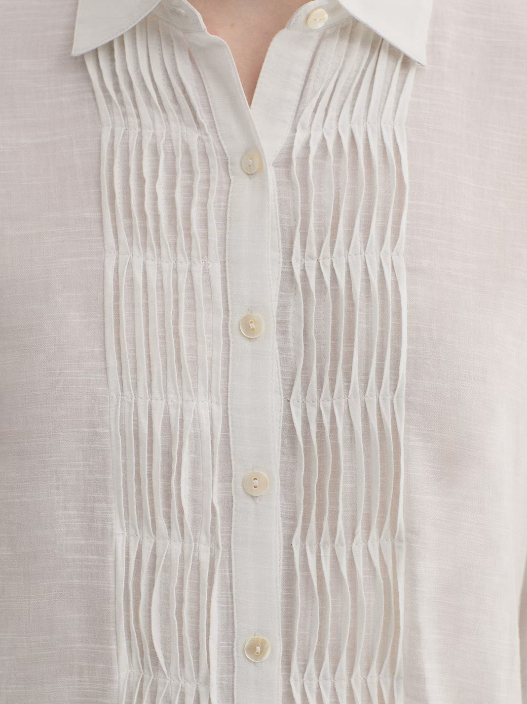 Camisa bimateria con pliegues